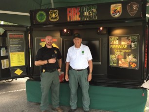 Andy Johnson and Bill Wiley with Firewise Display trailer, EDA 2017
