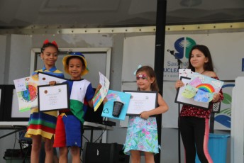 Art Contest winners on stage, EDA 2023