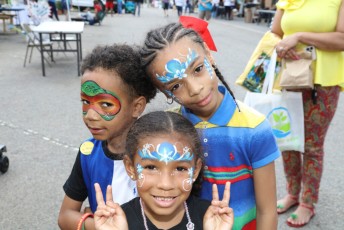 Three painted faces, Earth Day AIken, 2023